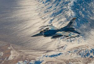 Read more about the article An F-16 Fighting Falcon flies over the Nevada Test and Training Range. The aircr