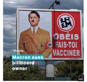 Read more about the article NEW  Macron sues a billboard operator for depicting him as Hitler in a banner.