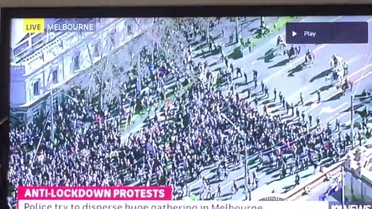 Read more about the article JUST  Chaotic scenes as protesters break through police barricades in Melbourne,