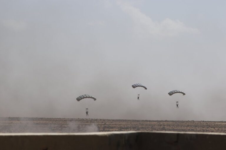 Read more about the article #Parachutes U.S. Special Operations Forces freefall into a small village for a m