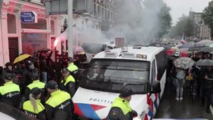 Read more about the article Protesters and police clashed in Amsterdam on Sunday during a rally against the