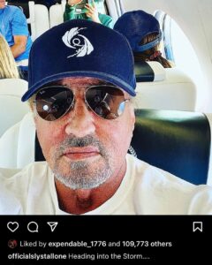 Read more about the article Stallone heading to the storm. With a Q hat. Okay.