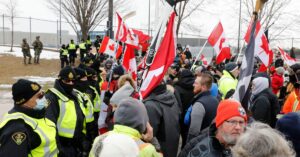 Read more about the article Canada-to-US Ambassador Bridge reopens, as COVID mandate ‘Convoy’ protests in Ottawa swells