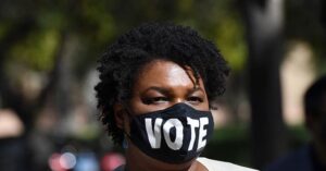 Read more about the article Judge Rules Against Abrams-backed Group, Upholds 2018 Georgia Voting Law